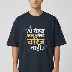 A navy blue short-sleeve t-shirt with a colorful printed Hindi text graphic on the front, displayed against a light gray background.