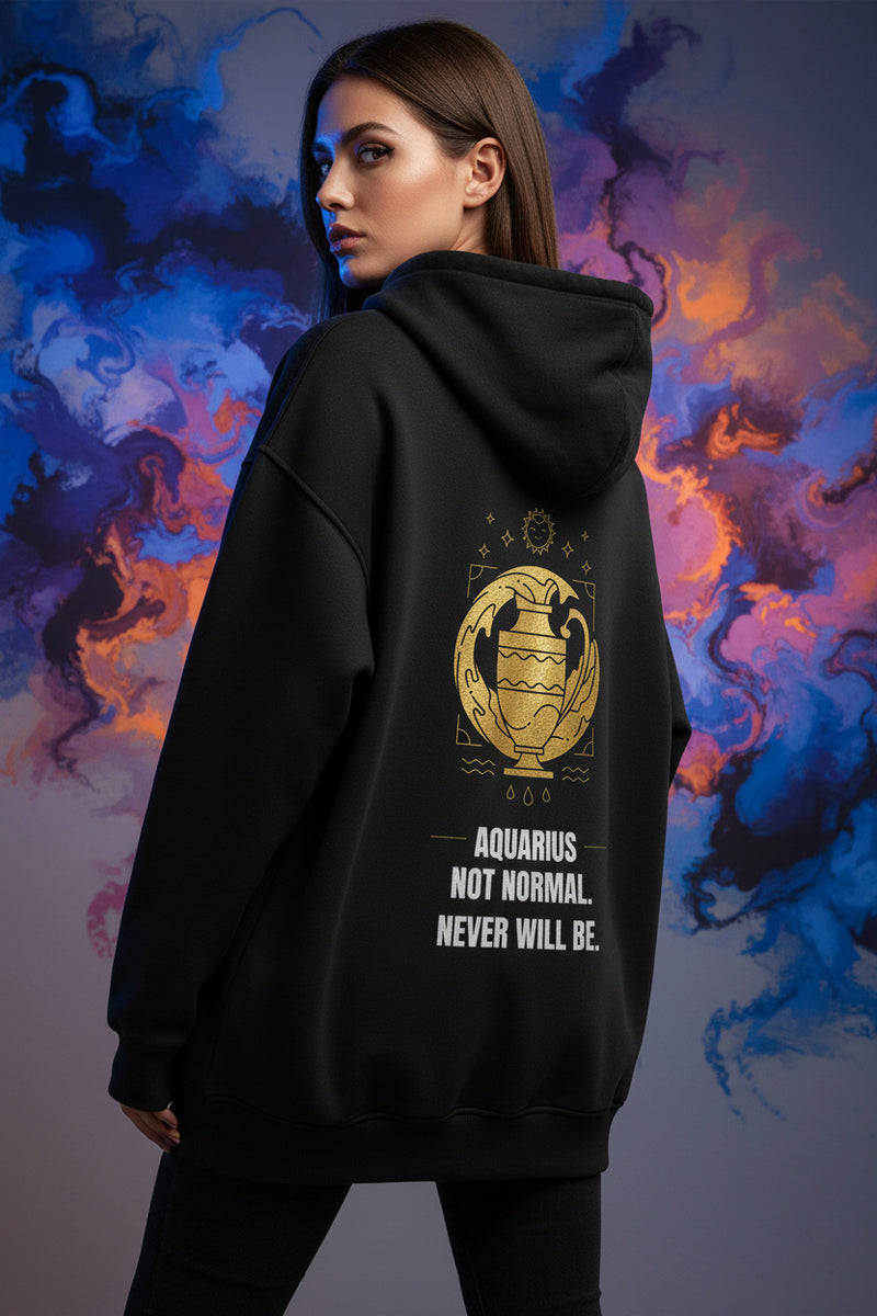Black hoodie with yellow Aquarius zodiac design and text on a white background