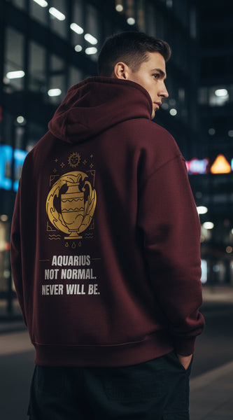 Maroon hoodie with yellow Aquarius zodiac design and text on a white background