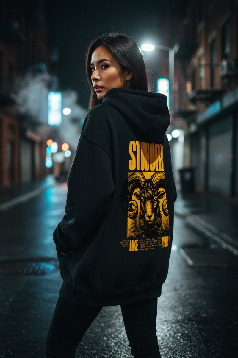 Black hoodie with yellow graphic and text on a white background