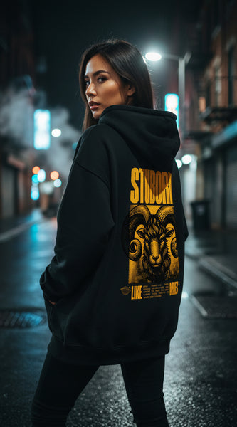 Black hoodie with yellow graphic and text on a white background