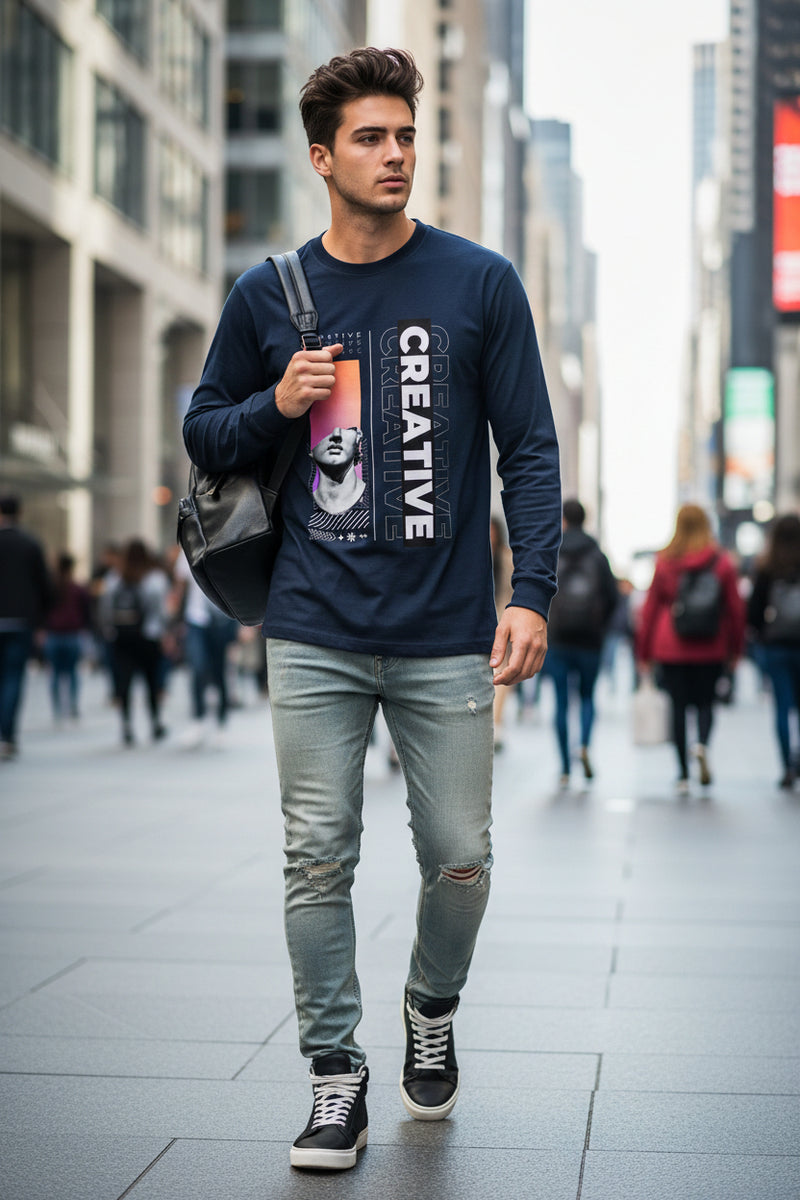 Blue  long-sleeve shirt with artistic design and 'CREATIVE' text on a white background