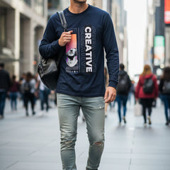 Blue  long-sleeve shirt with artistic design and 'CREATIVE' text on a white background