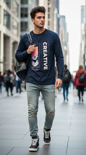 Blue  long-sleeve shirt with artistic design and 'CREATIVE' text on a white background