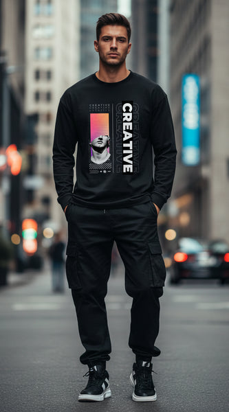 Black long-sleeve shirt with artistic design and 'CREATIVE' text on a white background