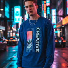 Navy blue long-sleeve shirt with artistic design and 'CREATIVE' text on a white background