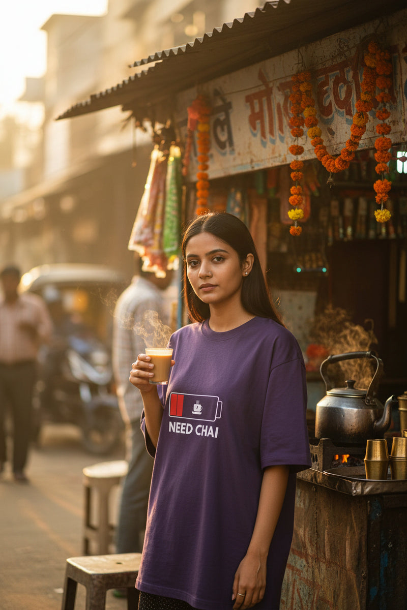 Purple t-shirt with 'Need Chai' graphic on a white background