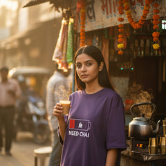 Purple t-shirt with 'Need Chai' graphic on a white background