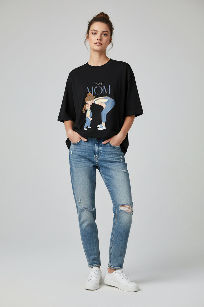 Black t-shirt with a graphic of a mother and child and the text 'Super Mom' on a white background.