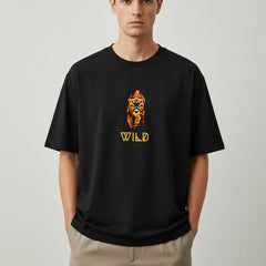 Black t-shirt with a colorful tiger graphic and 'WILD' text on a white background