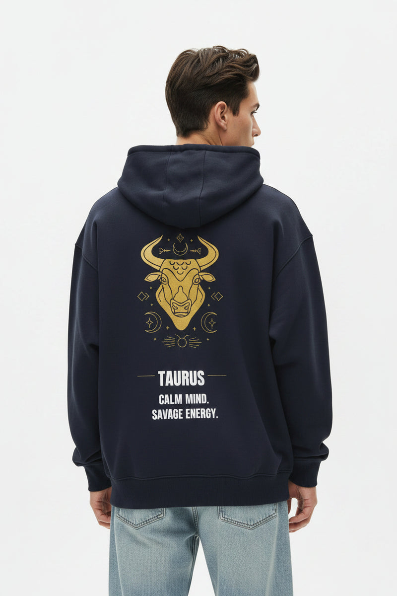 Blue hoodie with Taurus zodiac design on the back against a white background