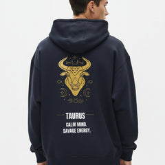 Blue hoodie with Taurus zodiac design on the back against a white background