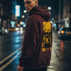 Maroon hoodie with yellow graphic and text on a white background