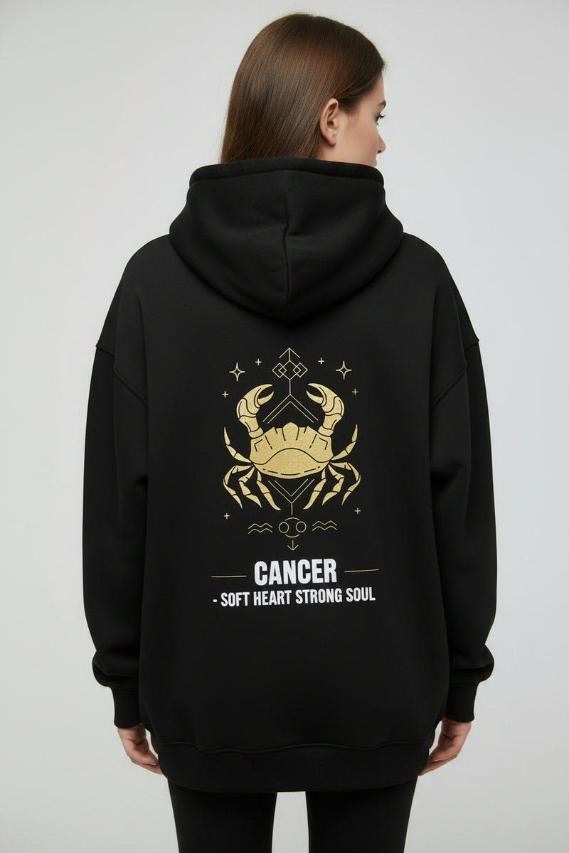 Black hoodie with yellow crab design and text on a white background