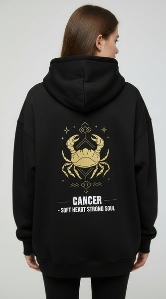 Black hoodie with yellow crab design and text on a white background
