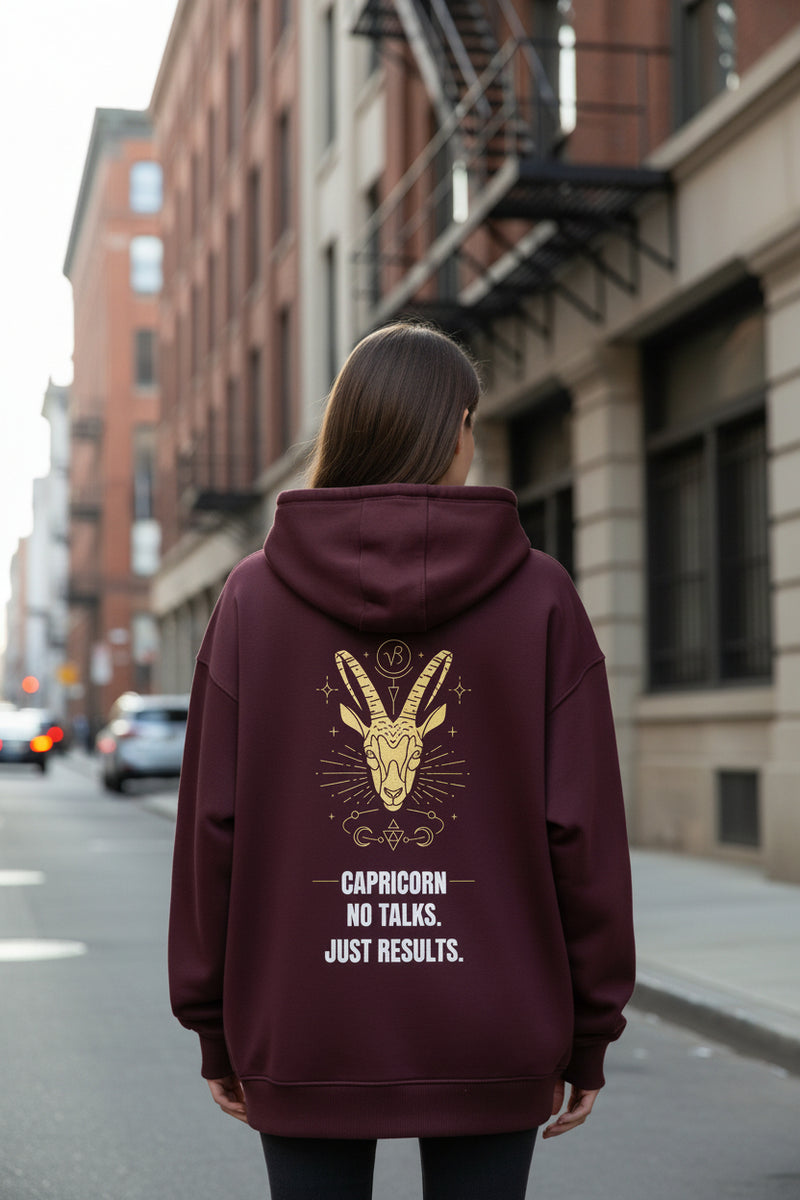 Maroon hoodie with a crab design and text on the back against a white background