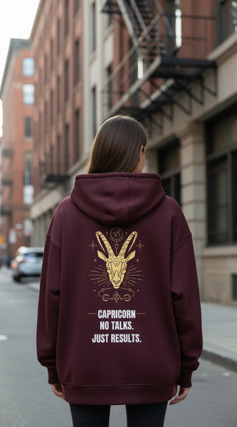 Maroon hoodie with a crab design and text on the back against a white background