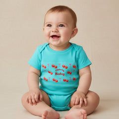 Blue baby onesie with red cherry design and 'Cherry Baby' text on a white background