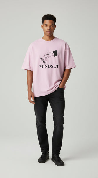 Pink t-shirt with a graphic and 'MINDSET' text on a white background