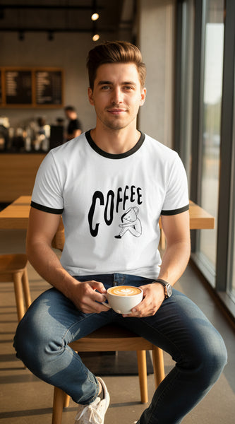 White t-shirt with black ringer sleeves and 'COFFEE' text on a white background