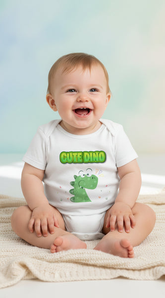 White baby onesie with green dinosaur design and 'Cute Dino' text on a white background