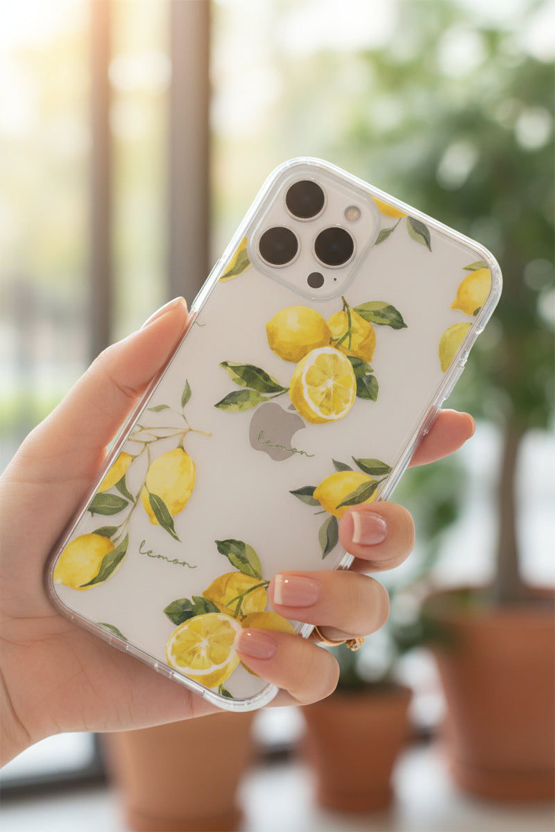 Phone case with lemon design on a light gray background