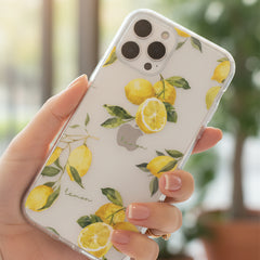 Phone case with lemon design on a light gray background