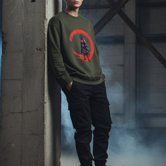 Olive Green sweatshirt with a character design and red moon on a white background