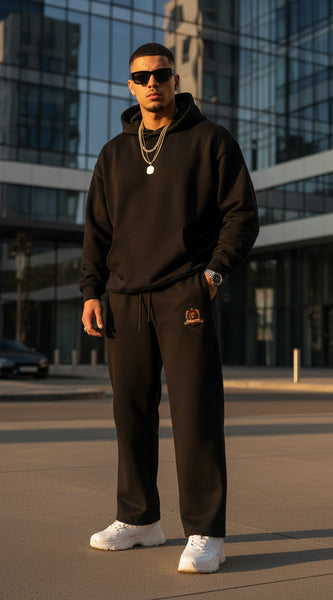 Black pants with a logo on a white background