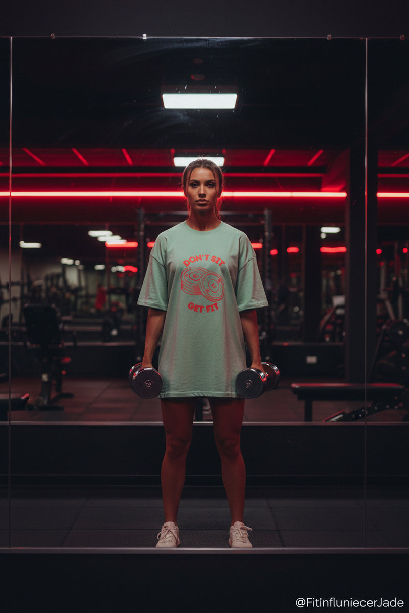 Green t-shirt with red graphic and text on a white background