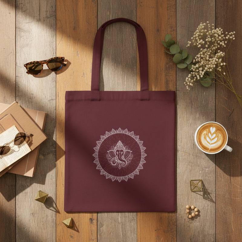 Maroon tote bag with 'No Pain, Just Gain' text held by a person against a gray background