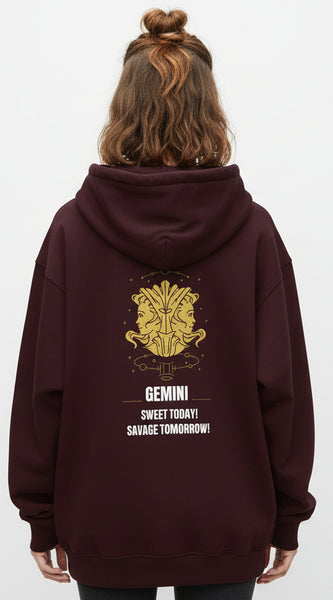 Maroon hoodie with yellow astrological design and text on a white background