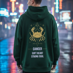 Green hoodie with a crab design and text on the back against a white background