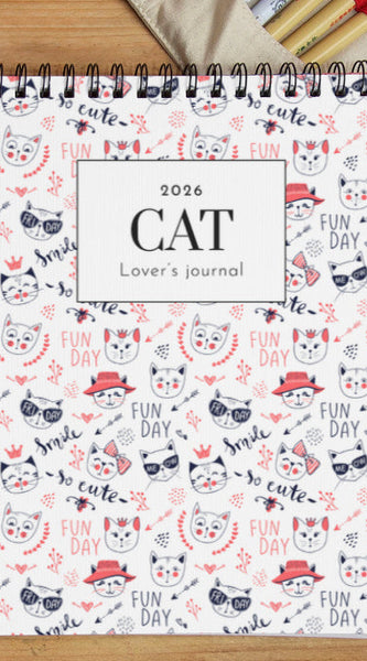 2026 cat lover's journal with stationery items on a wooden surface