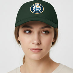 Green cap with 'Adventure into the Wild' logo on a light gray background