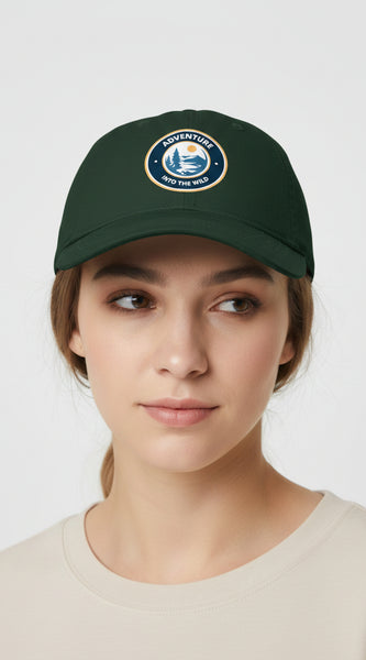 Green cap with 'Adventure into the Wild' logo on a light gray background