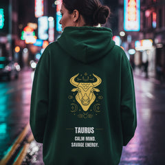 Green hoodie with Taurus zodiac design on the back against a white background