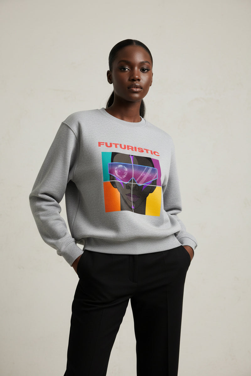Gray sweatshirt with a graphic design featuring a face and 'FUTURISTIC' text on a white background