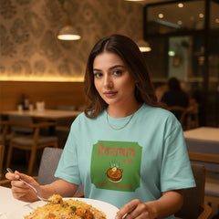 Light blue t-shirt with a green graphic and text on a white background