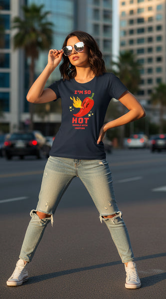 Woman wearing a blue t-shirt with a red pepper graphic and text.
