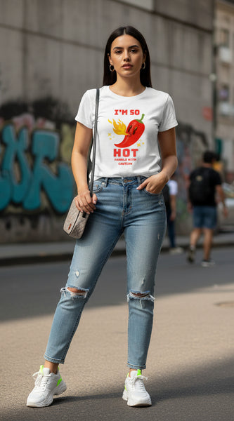 Woman wearing a white t-shirt with a red pepper graphic and text.