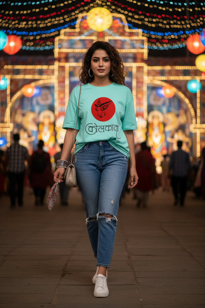 Light blue t-shirt with a red circular design and black text on a white background
