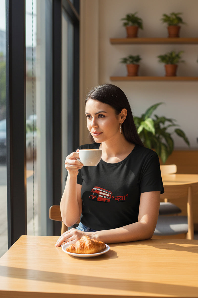 Woman wearing a black t-shirt with a red graphic design on a white background