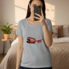 Woman wearing a gray t-shirt with a red double-decker bus graphic on a white background