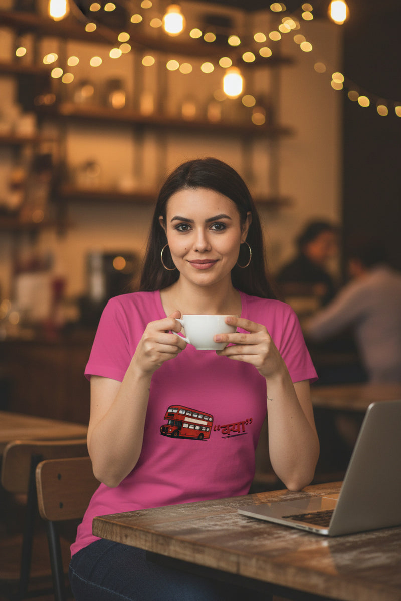 Woman wearing a pink t-shirt with 'Girls Trip 2026' text design on a white background