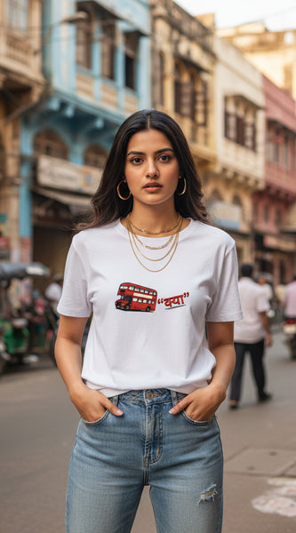 Woman wearing a white t-shirt with a red double-decker bus graphic and text on a white background