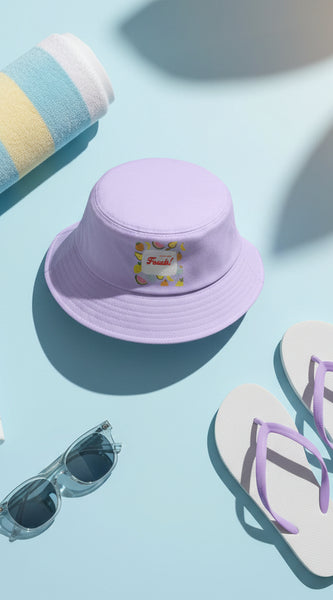 Purple bucket hat with fruit design and text on a light gray background