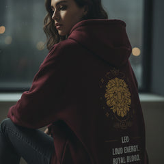 Maroon hoodie with gold lion design and text on a white background