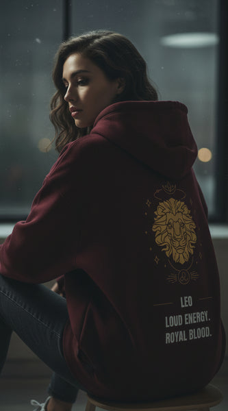 Maroon hoodie with gold lion design and text on a white background