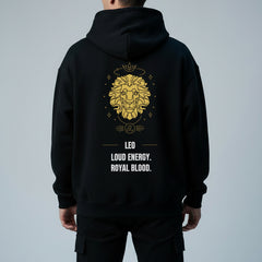 Black hoodie with a gold lion design and text on the back against a white background
